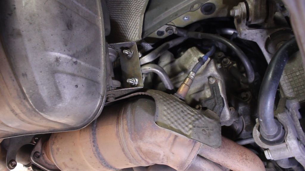 Disconnect the muffler from the muffler support.