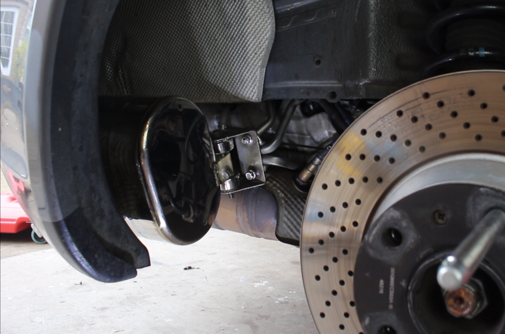Now it's time to begin install the ECG Performance exhaust system. Start by installing one of the ECG Performance mufflers.